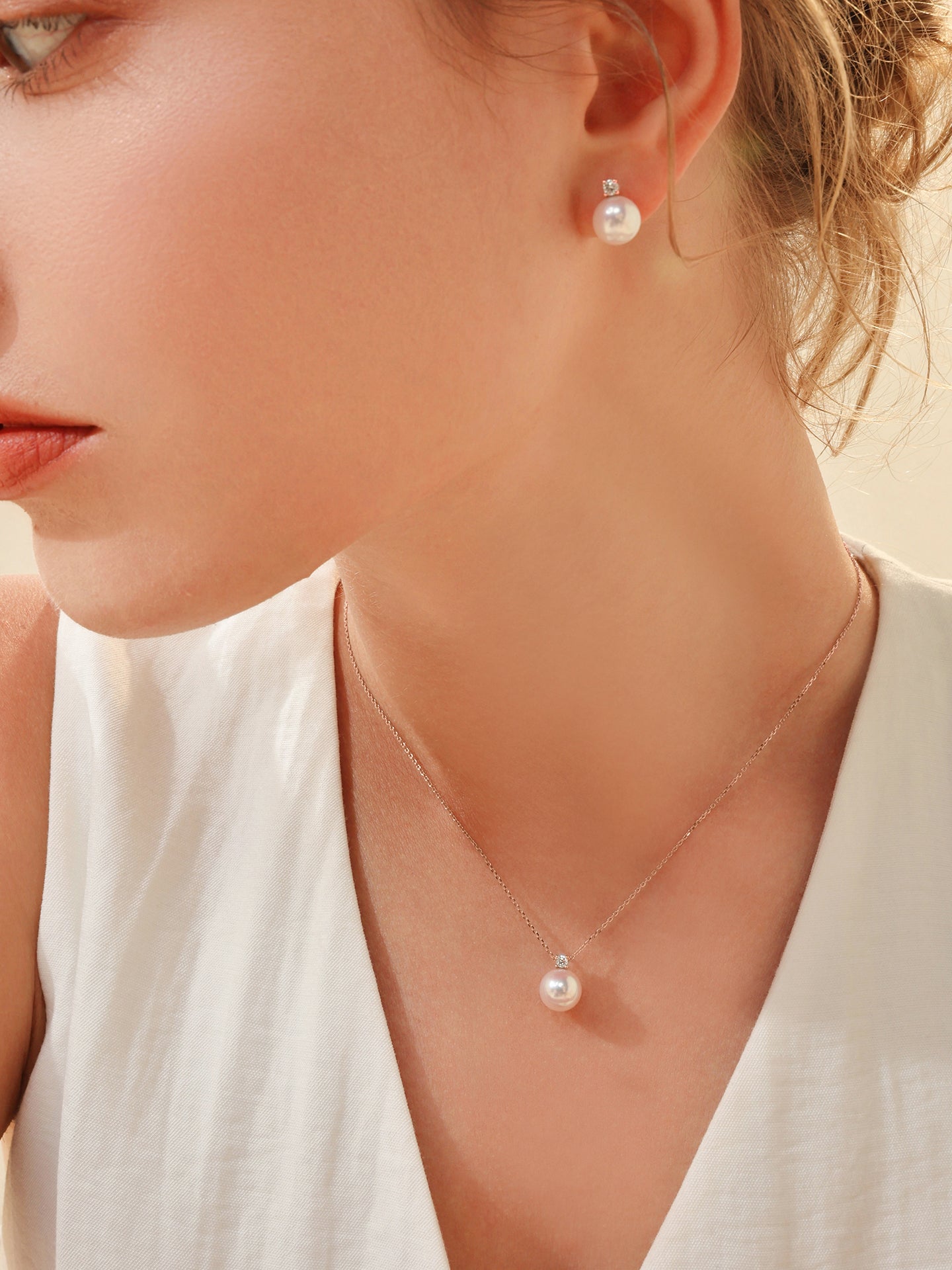 Princess Diana-style 18K gold Akoya saltwater pearl stud earrings (set with natural diamonds)